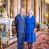 The King and The Queen, photographed in the Blue Drawing Room at Buckingham Palace.