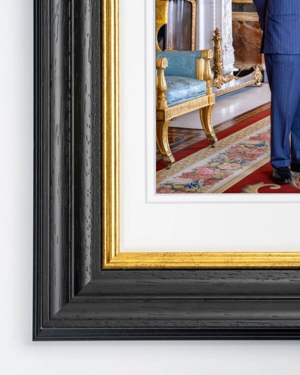 Windsor Framed Print of their Majesties The King and The Queen in the Blue Drawing Room at Buckingham Palace.