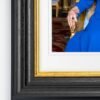 Windsor Framed Print of Her Majesty The Queen seated in the Blue Drawing Room at Buckingham Palace.